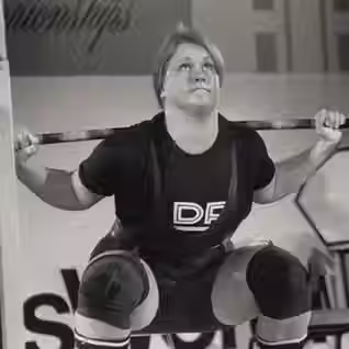 Jan Todd lifts heavy weights in competition.