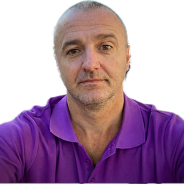 Man in a purple polo shirt looking forward