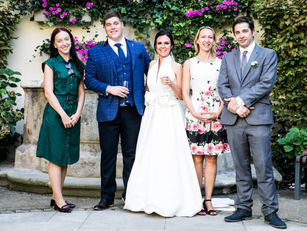 Team of wedding planners with the bride and groom | Destinaton wedding planner