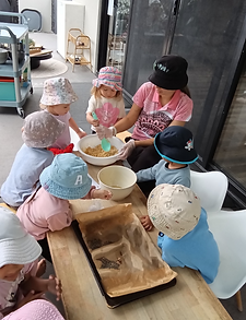 tehlia an dkids makign cookies.png