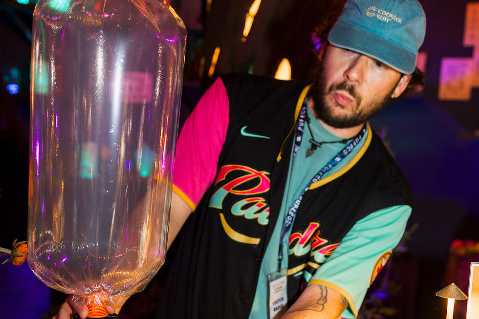 Coastal Sun Brand Ambassador Joey filling a Storz and Bickel volcano vaporizer bag at event