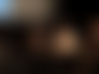 a speaker at Cannaclub event speaks into the microphone next to other panelists