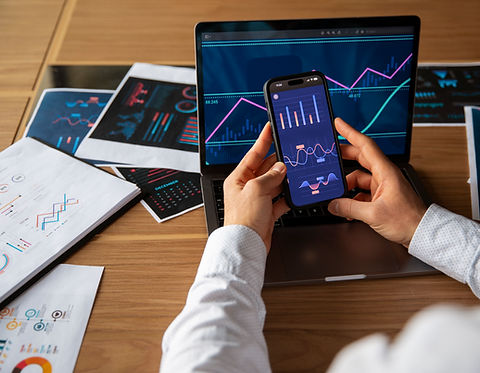 office-workers-using-finance-graphs (2).jpg