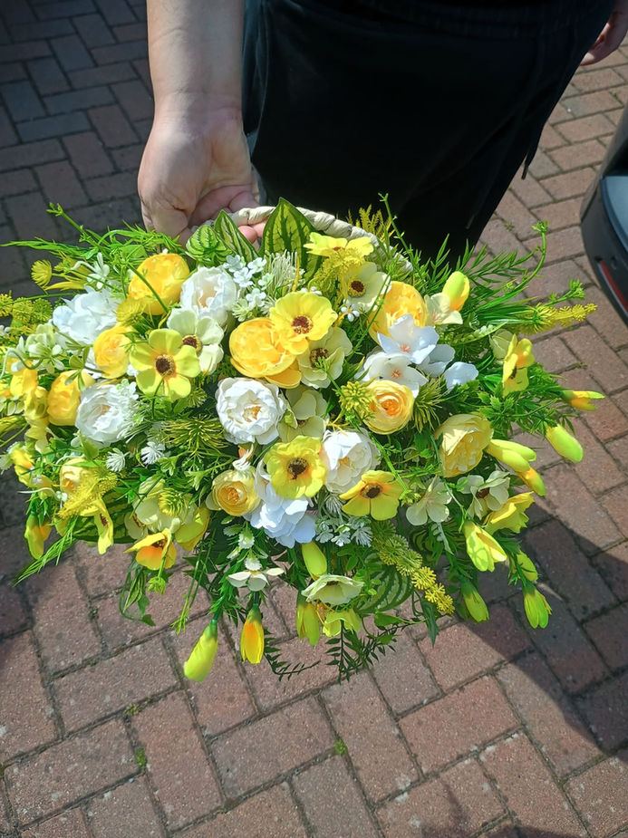 Handmade yellow artificial wall planter with tulips hydrangeas and peonies - Top View