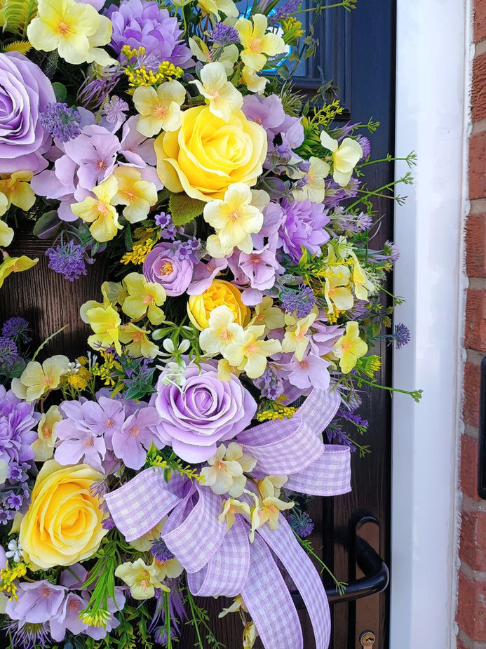 Handmade matching bow USA imported ribbon on yellow and lilac artificial door wreath detail