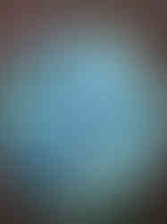 Handmade artificial hanging basket with blue and ivory faux flowers arranged in a full, elegant display for your garden