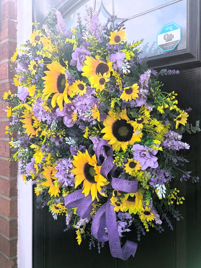 Handmade yellow and purple sunflower artificial door wreath - side view