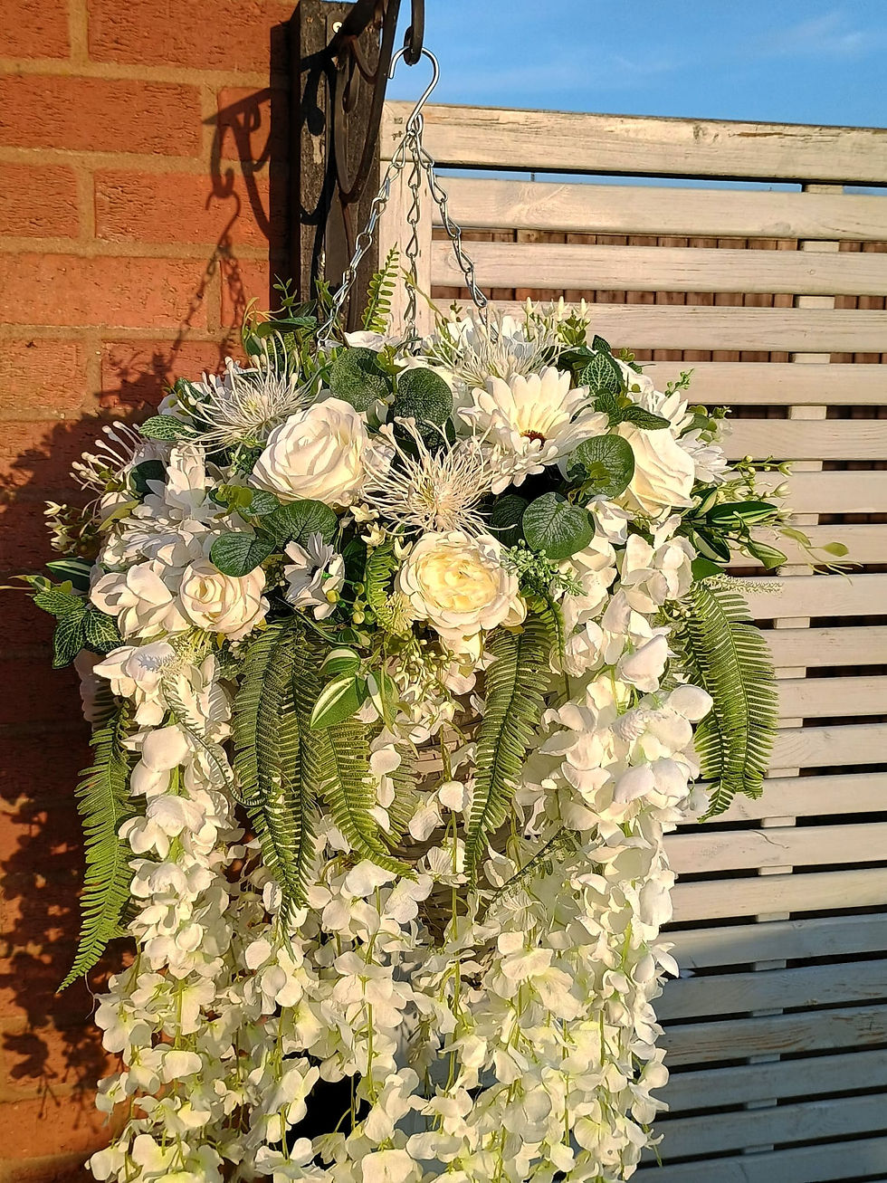 Thumbnail: Luxury XL artificial ivory flower arrangement in a cone‑shaped wicker hanging basket, featuring full blooms and natural green