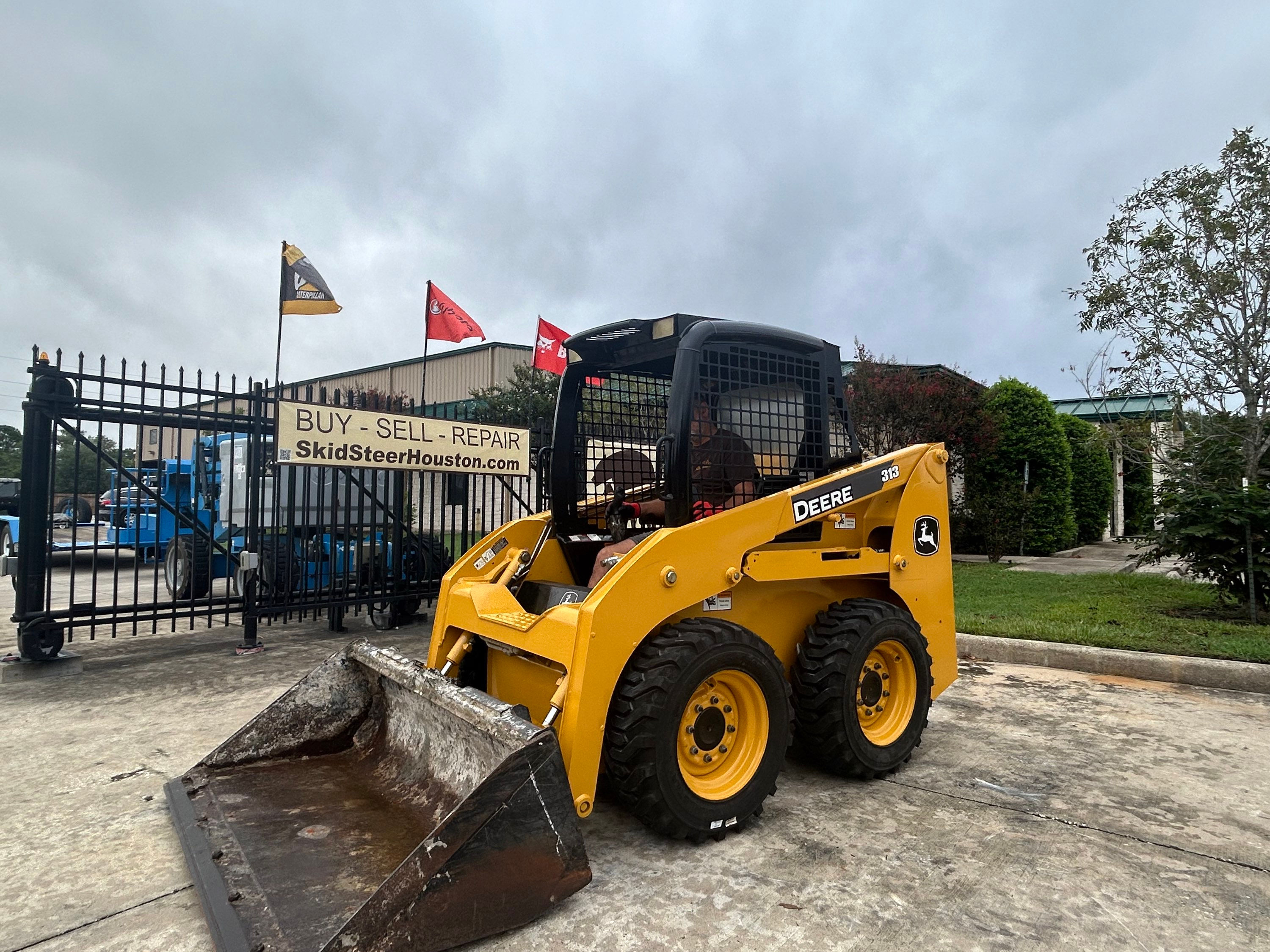 SOLD!!! 2012 John Deere Model 313 Skid Steer