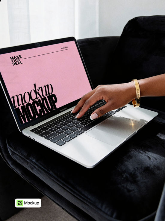 Laptop Interaction Affinity Mockup Hands with gold bracelet actively using laptop on black velvet chair showing desktop work