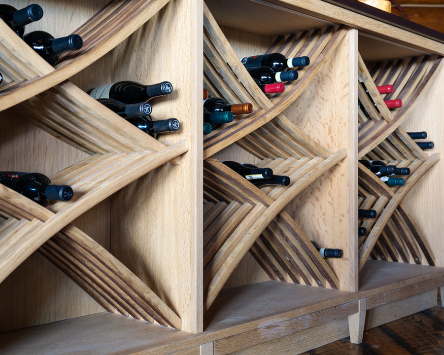 Lazy G Remodel — custom built-in wine rack with diagonal wood storage cubbies, Big Sky, Montana, Red Tree Design