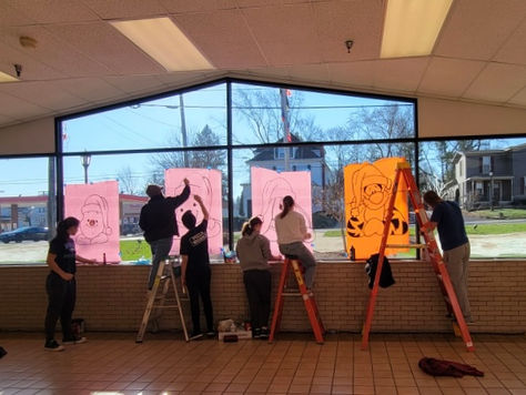 Hubbard art students decorate the town with holiday murals