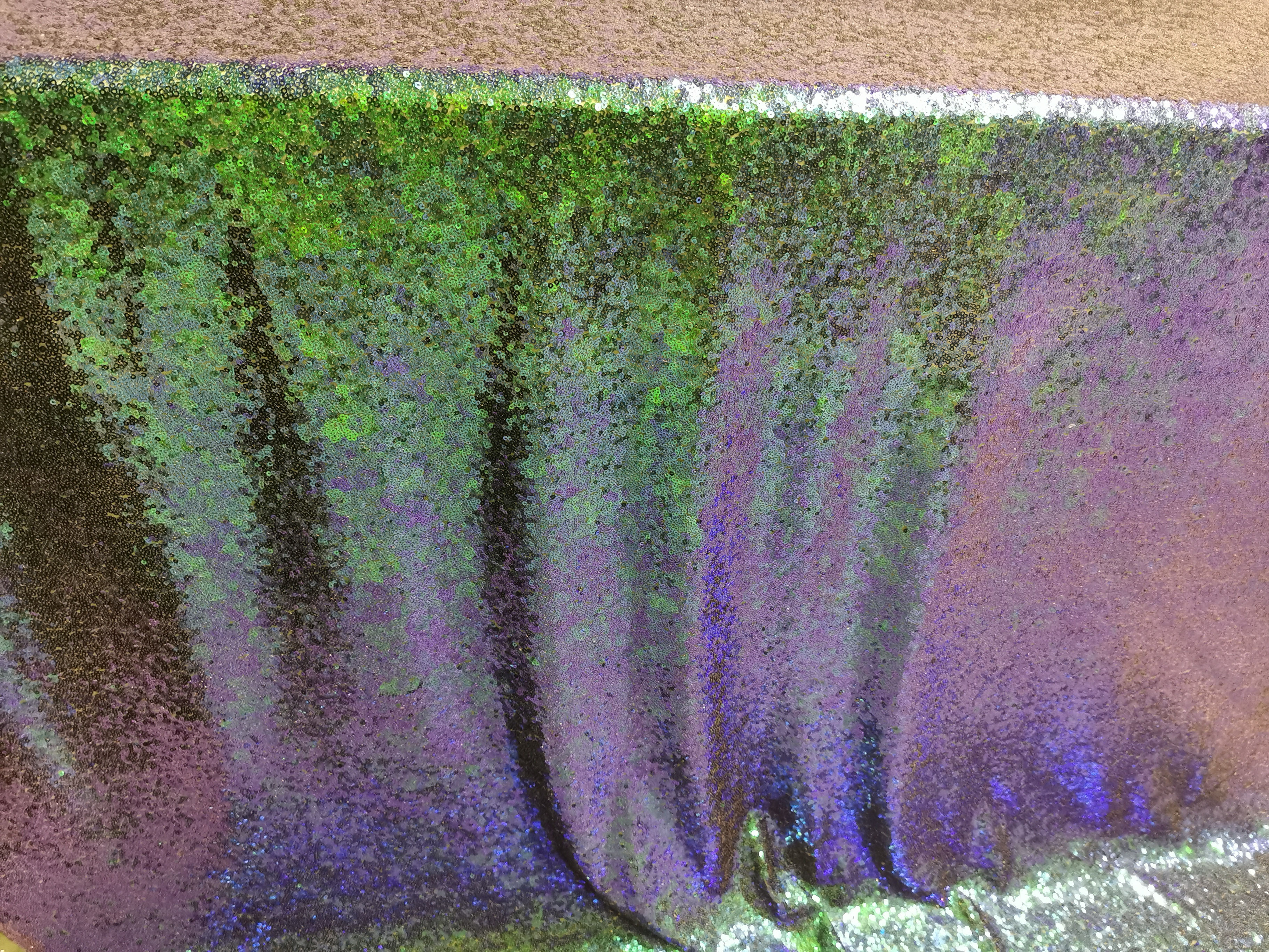 Green Blue Iridescent 3mm Sparkly Sequin Fabric on green mesh backing