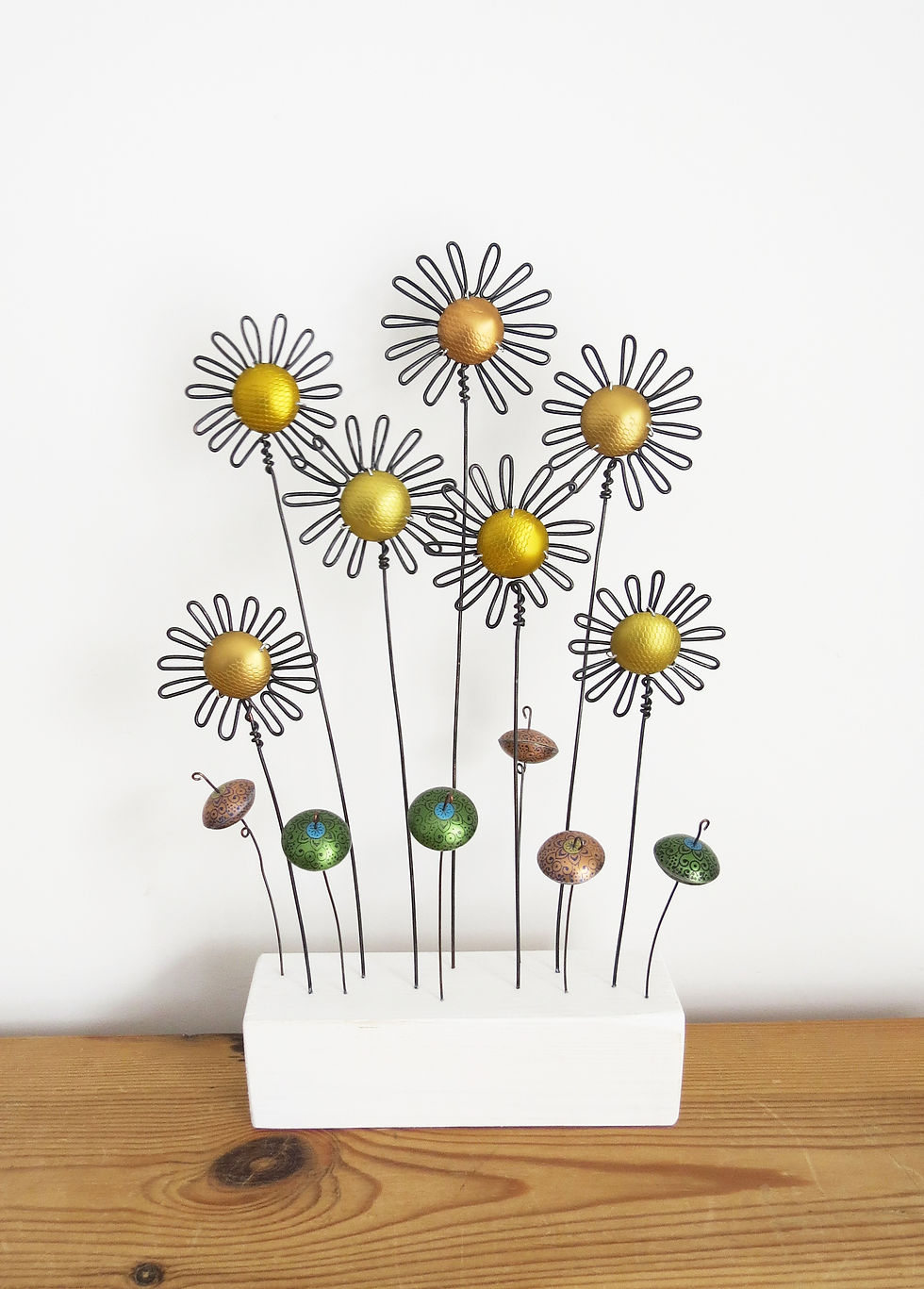 Gold Coloured Daisies with Green and Peach Pods Front View
