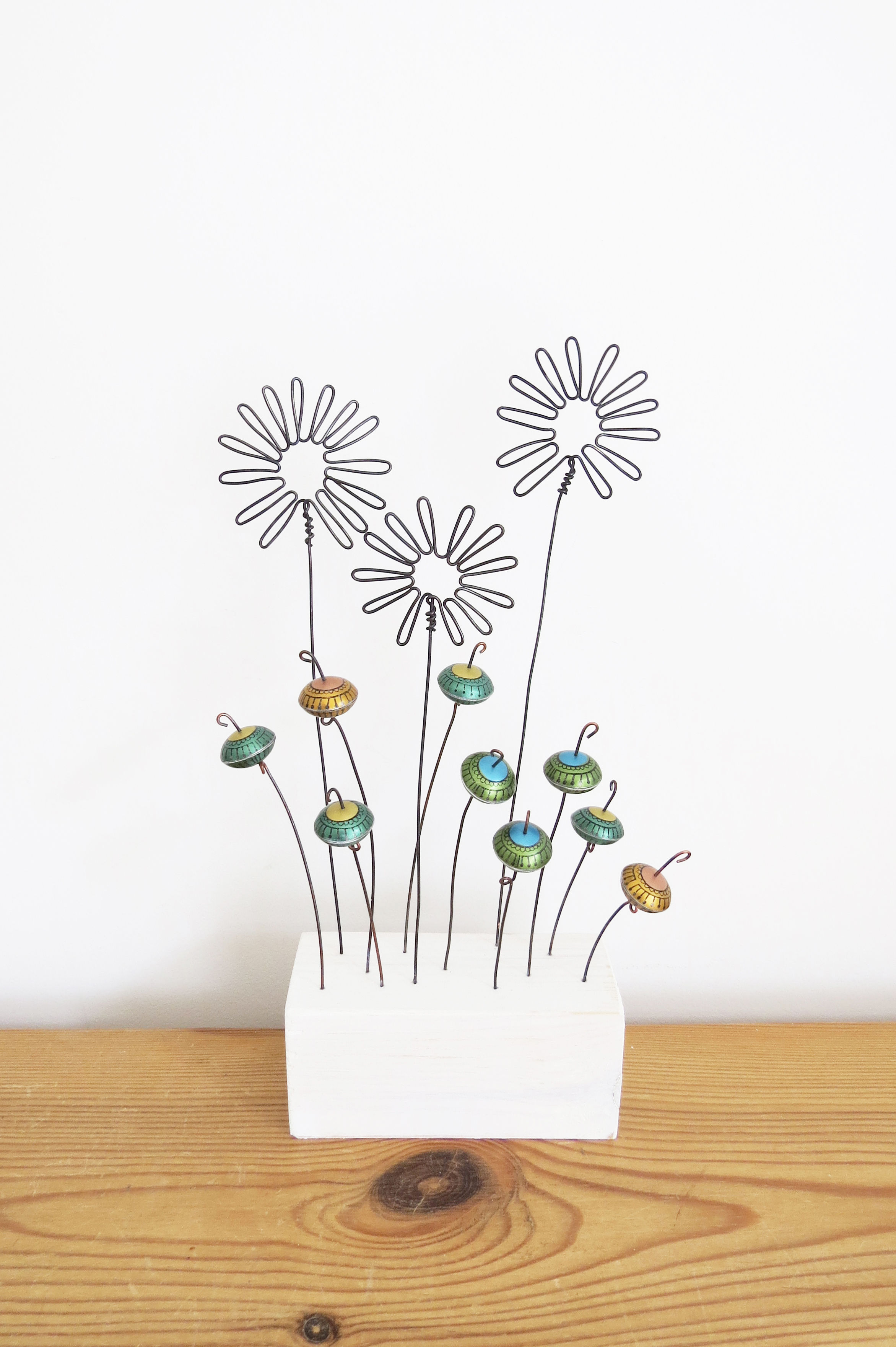 Wire Daisies with Green and Gold Pods Front View