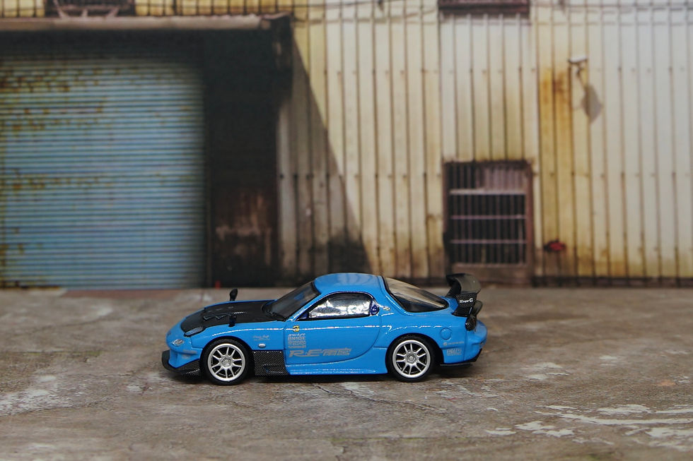 Thumbnail: MiniGT 1/64 Mazda RX-7 RE-Amemiya 20B NA 3ROTOR-7 “Ama-san Go” MGT01046-L