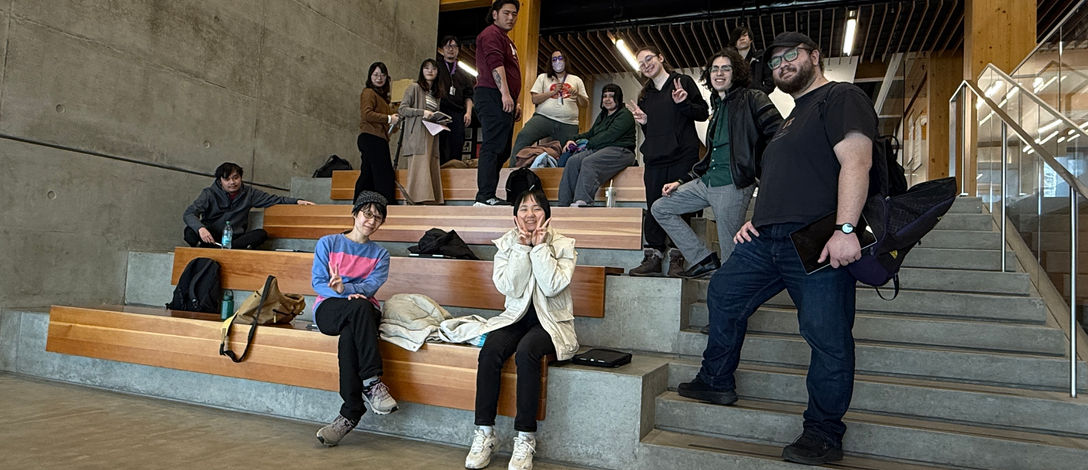 An image of drawing club members posing after the drawing session.