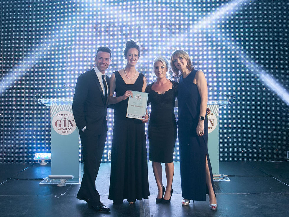 Jazz accepting her award for Gin Event of the Year at the Scottish Gin Awards 2018.