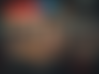 Thai street noodle vendor serving at night