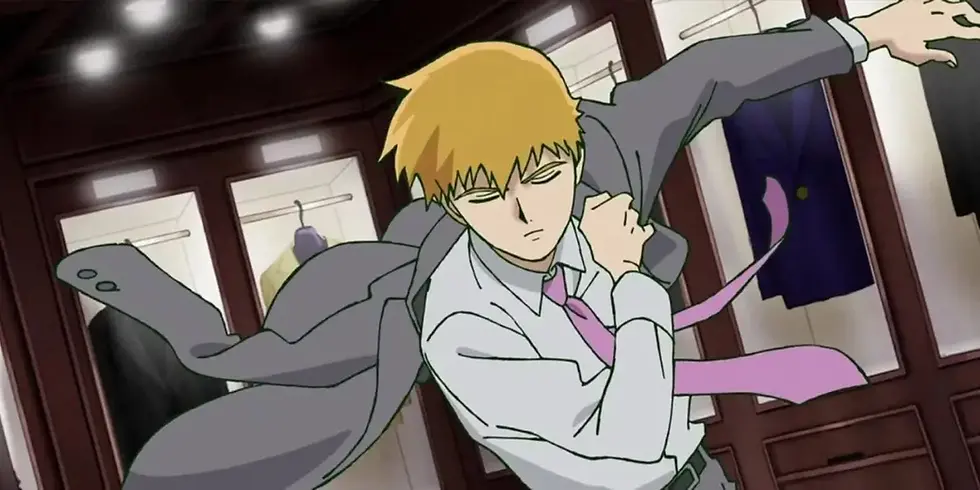 Reigen putting on a coat