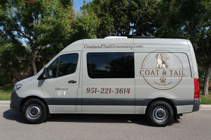 Grooming van with CoatandTailGrooming.com, 951-221-3614, and Coat & Tail Grooming text.