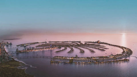 Waterfront beach mansion at Palm Jebel Ali with private beach and panoramic sea views at sunset