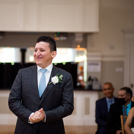 Groom walks down the aisle in the Grand Ballroom at Revel 32°