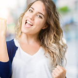 Beautiful young blonde woman over isolat