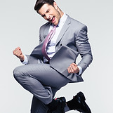 Funny cheerful businessman jumping in ai