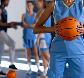2holding-basketball-female-player-in-uniform-stand-2025-04-03-09-15-16-utc.jpg