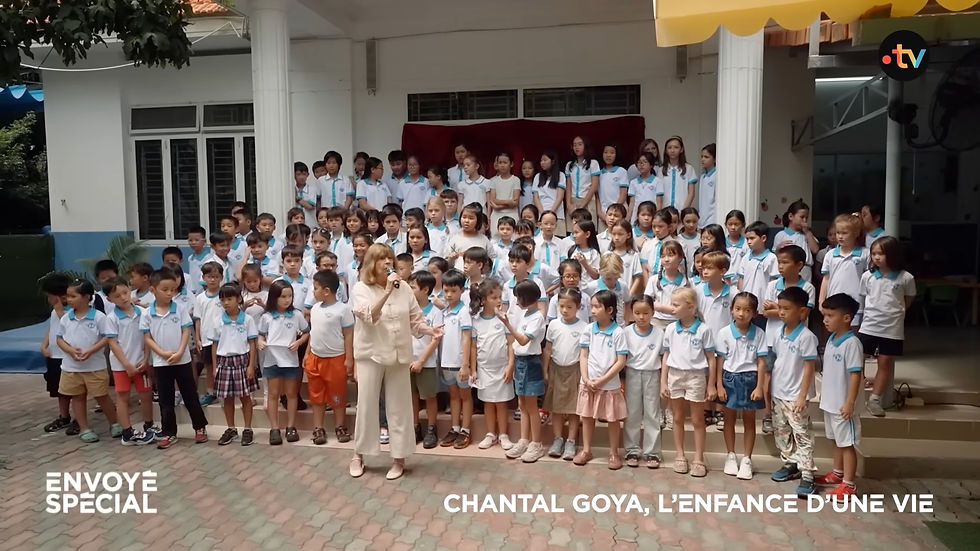 Chantal Goya welcomed by international schoolchildren in Ho Chi Minh City during her return to Vietnam after nearly 80 years.