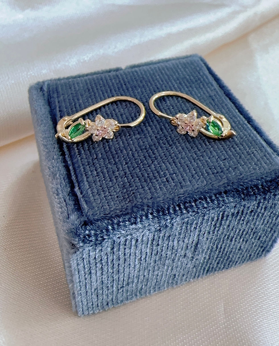 Miniatura: Aretes asa flor oro 18k 