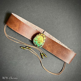 Stone, polyester cord, resin, glass beads