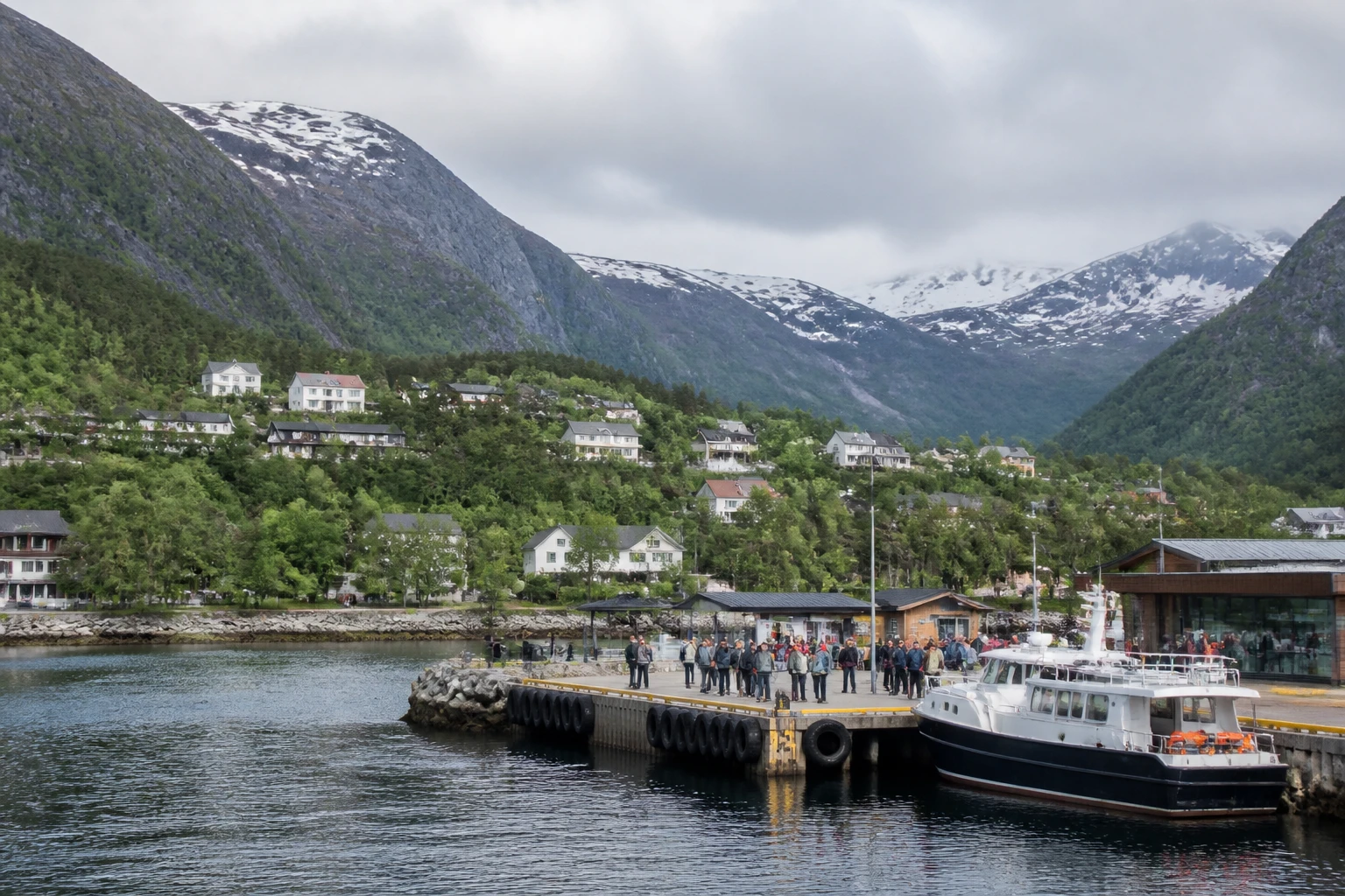 Representative cruise port destination view: Eidfjord, Norway; passenger waterfront and harbor water, not an exact landmark photograph.