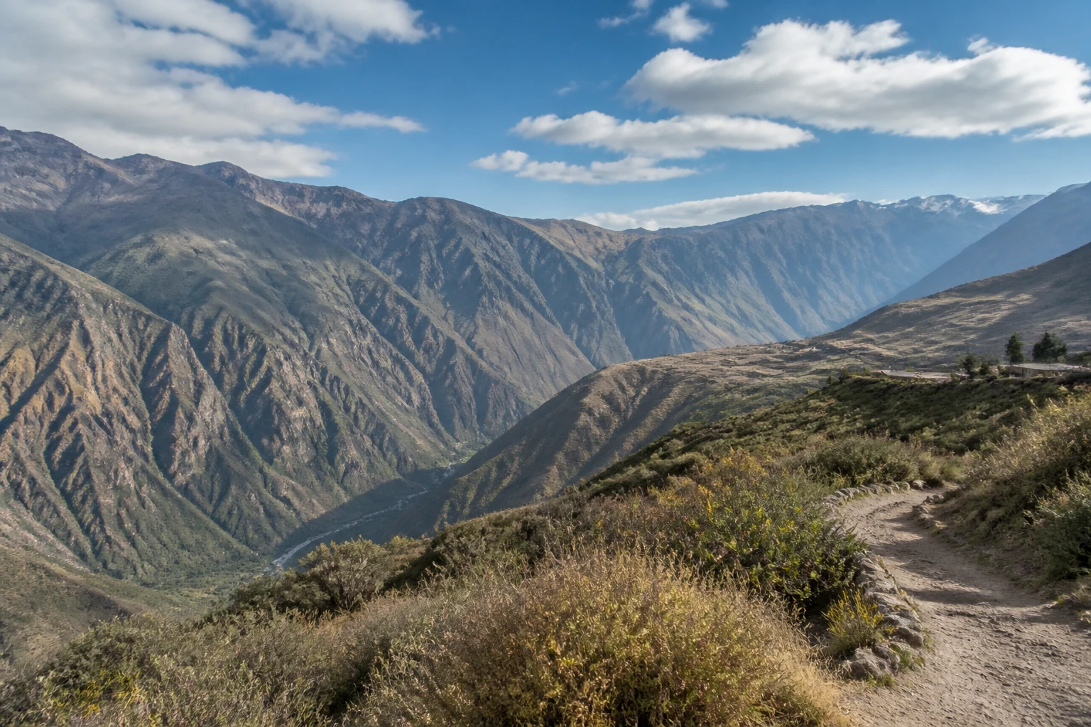Representative nature destination view: Arequipa and Colca Canyon, Peru; mountain or canyon terrain and regional vegetation, not an exact landmark photograph.