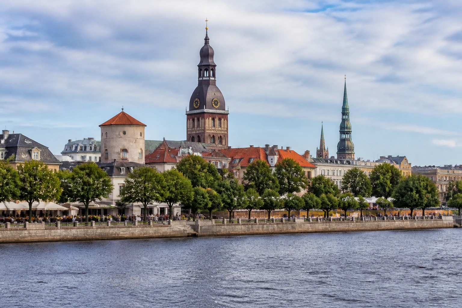 Representative historic city destination view: Riga, Latvia; passenger waterfront and harbor water, not an exact landmark photograph.