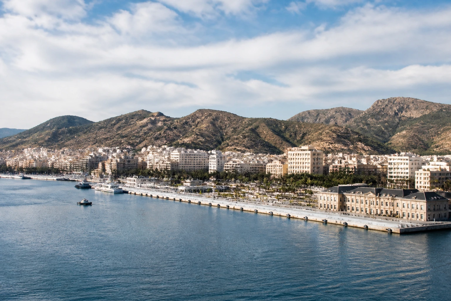 Representative cruise port destination view: Cartagena, Spain; passenger waterfront and harbor water, not an exact landmark photograph.