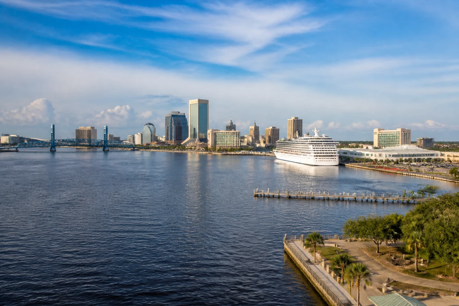 Representative cruise port destination view: Jacksonville, United States; passenger waterfront and harbor water, not an exact landmark photograph.
