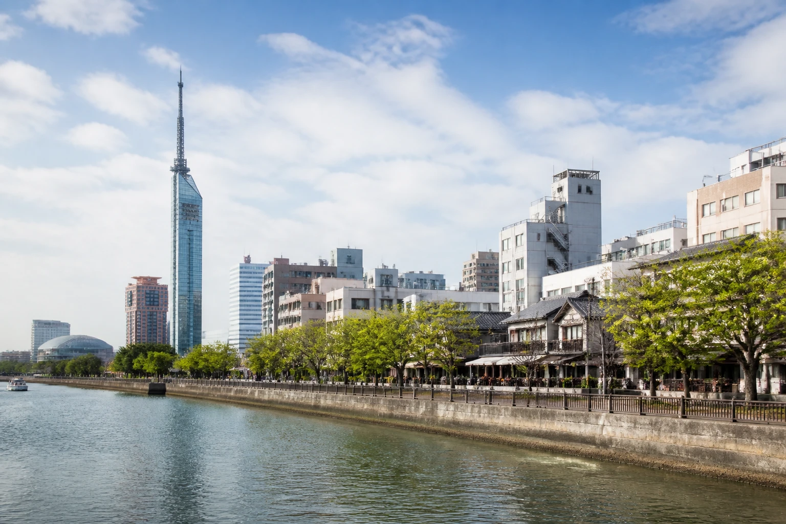 Representative city destination view: Fukuoka, Japan; passenger waterfront and harbor water, not an exact landmark photograph.
