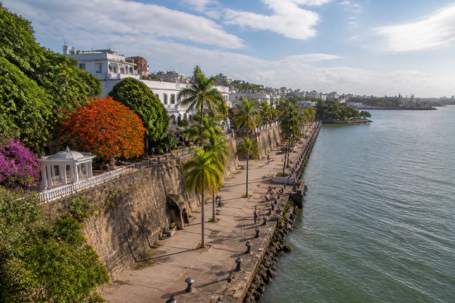 Representative city destination view: Santo Domingo, Dominican Republic; passenger waterfront and harbor water, not an exact landmark photograph.