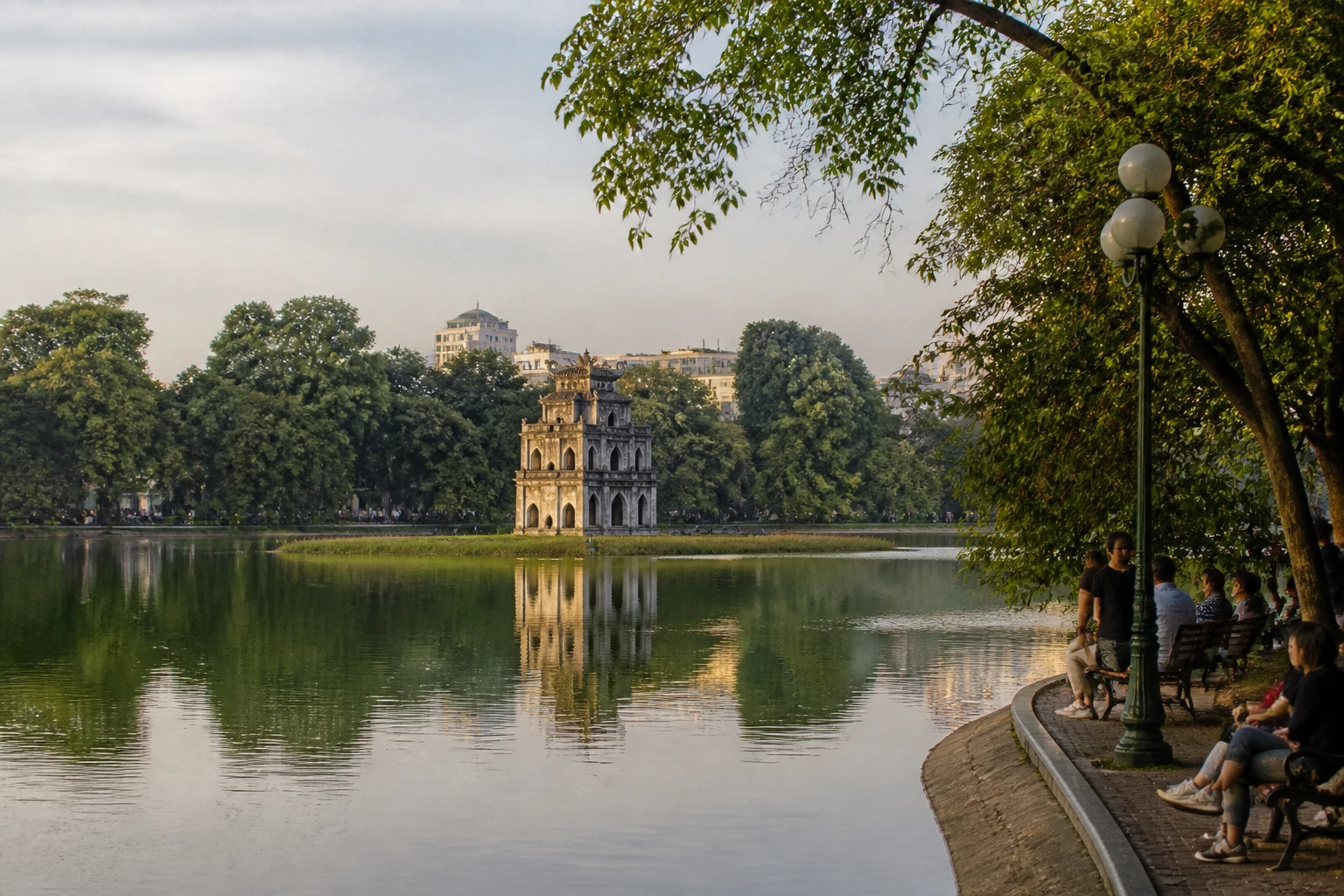 Representative city destination view: Hanoi, Vietnam; heritage-scale streetscape and regional architecture, not an exact landmark photograph.