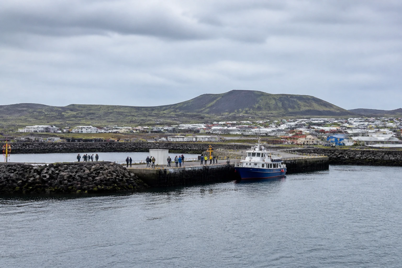 Representative cruise port destination view: Reykjanes, Iceland; passenger waterfront and harbor water, not an exact landmark photograph.