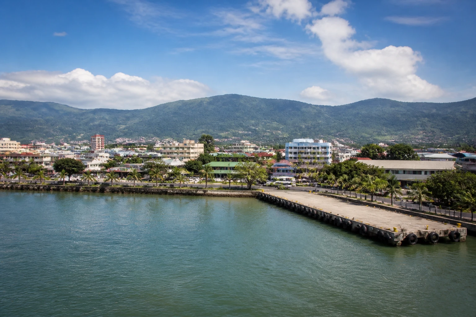 Representative cruise port destination view: Puntarenas, Costa Rica; passenger waterfront and harbor water, not an exact landmark photograph.