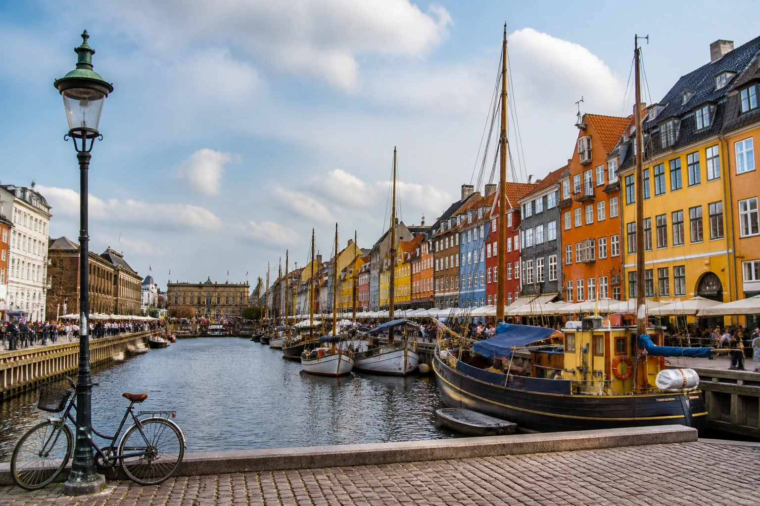 Representative city destination view: Copenhagen, Denmark; passenger waterfront and harbor water, not an exact landmark photograph.