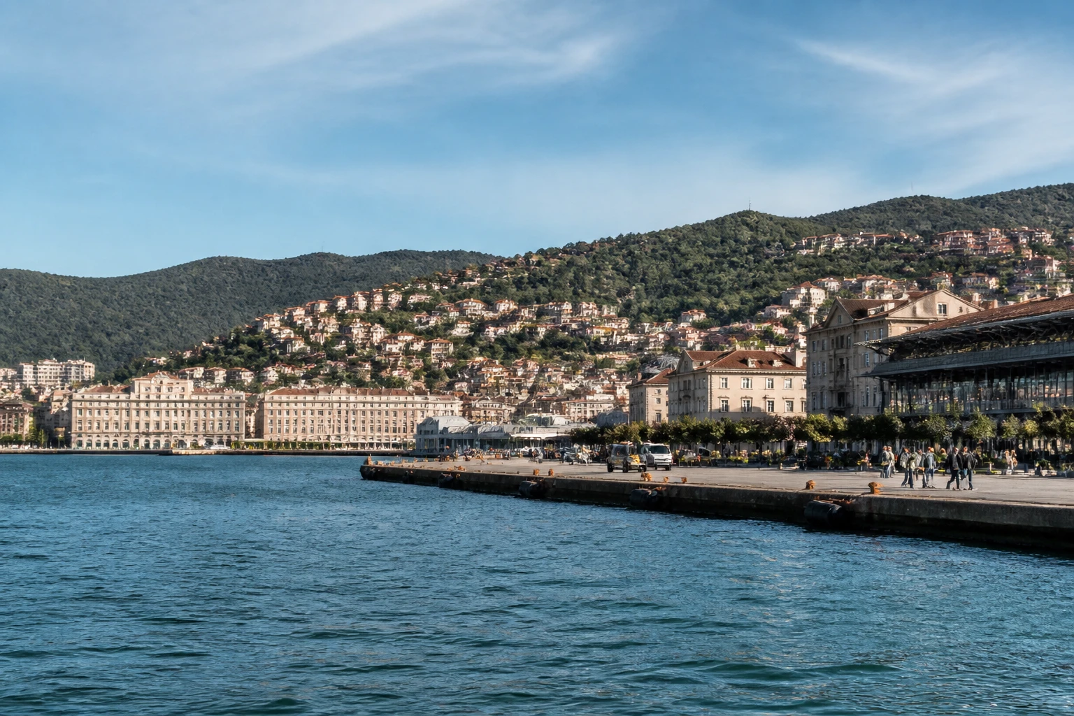 Representative cruise port destination view: Trieste, Italy; passenger waterfront and harbor water, not an exact landmark photograph.