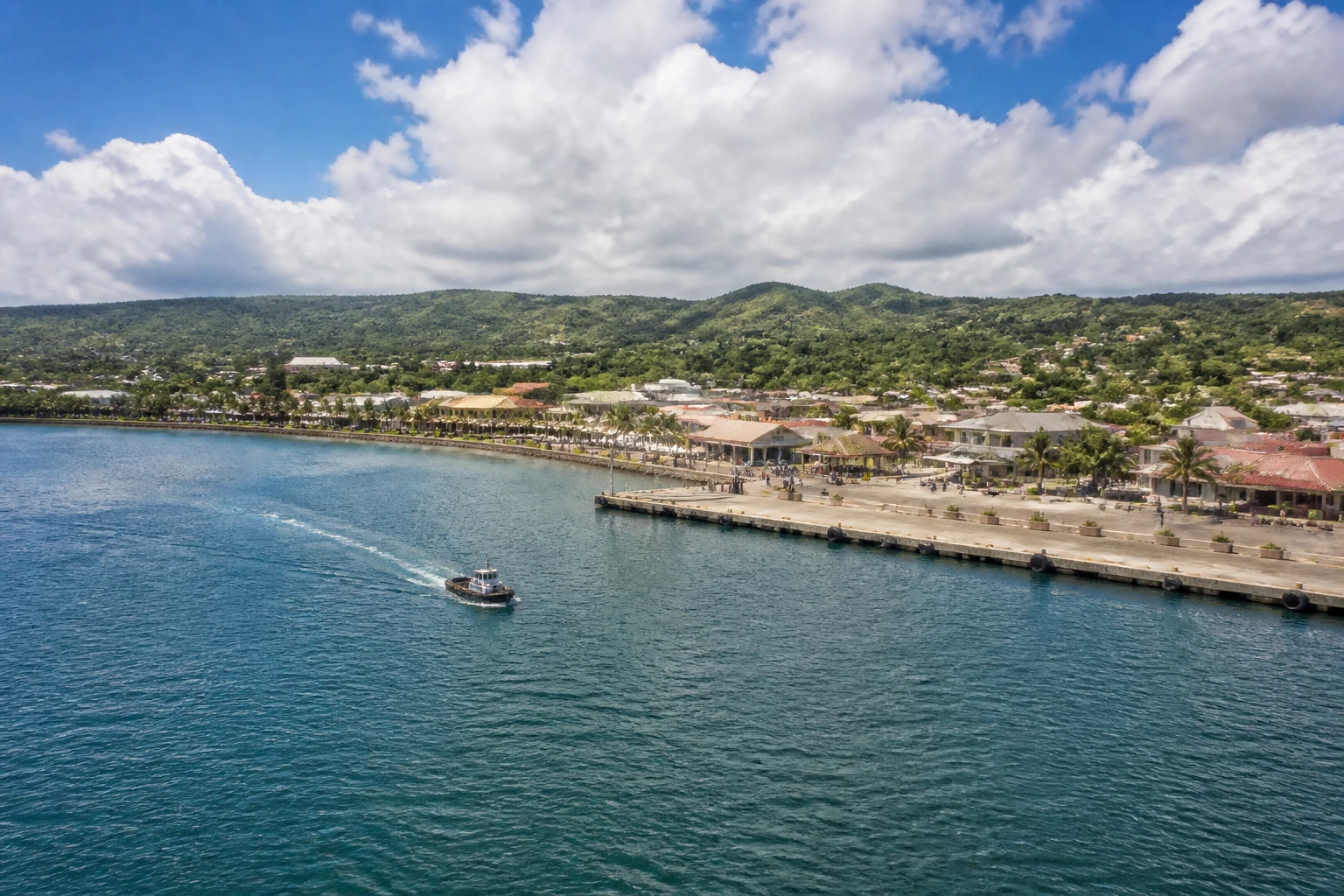 Representative cruise port destination view: Falmouth, Jamaica; passenger waterfront and harbor water, not an exact landmark photograph.
