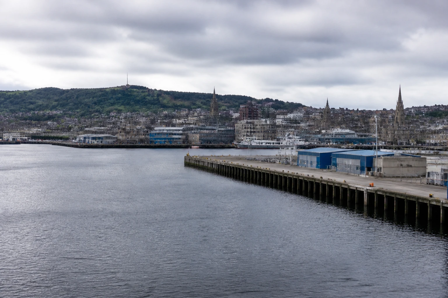 Representative cruise port destination view: Dundee, United Kingdom; passenger waterfront and harbor water, not an exact landmark photograph.