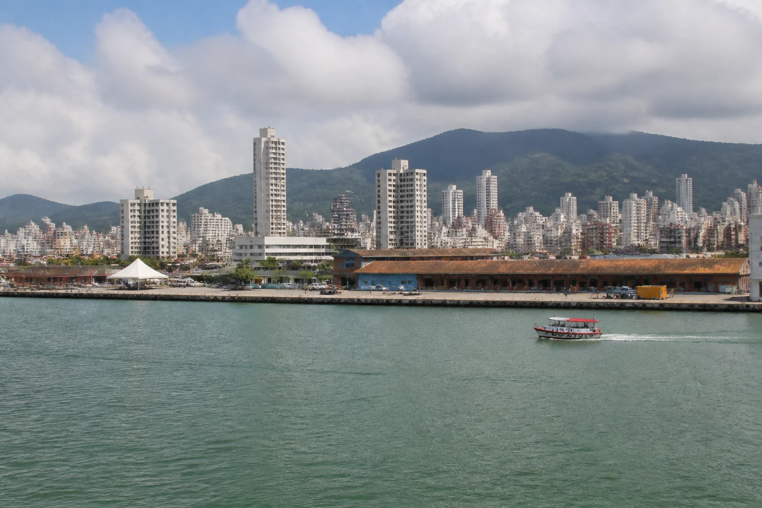 Representative cruise port destination view: Itajai, Brazil; passenger waterfront and harbor water, not an exact landmark photograph.