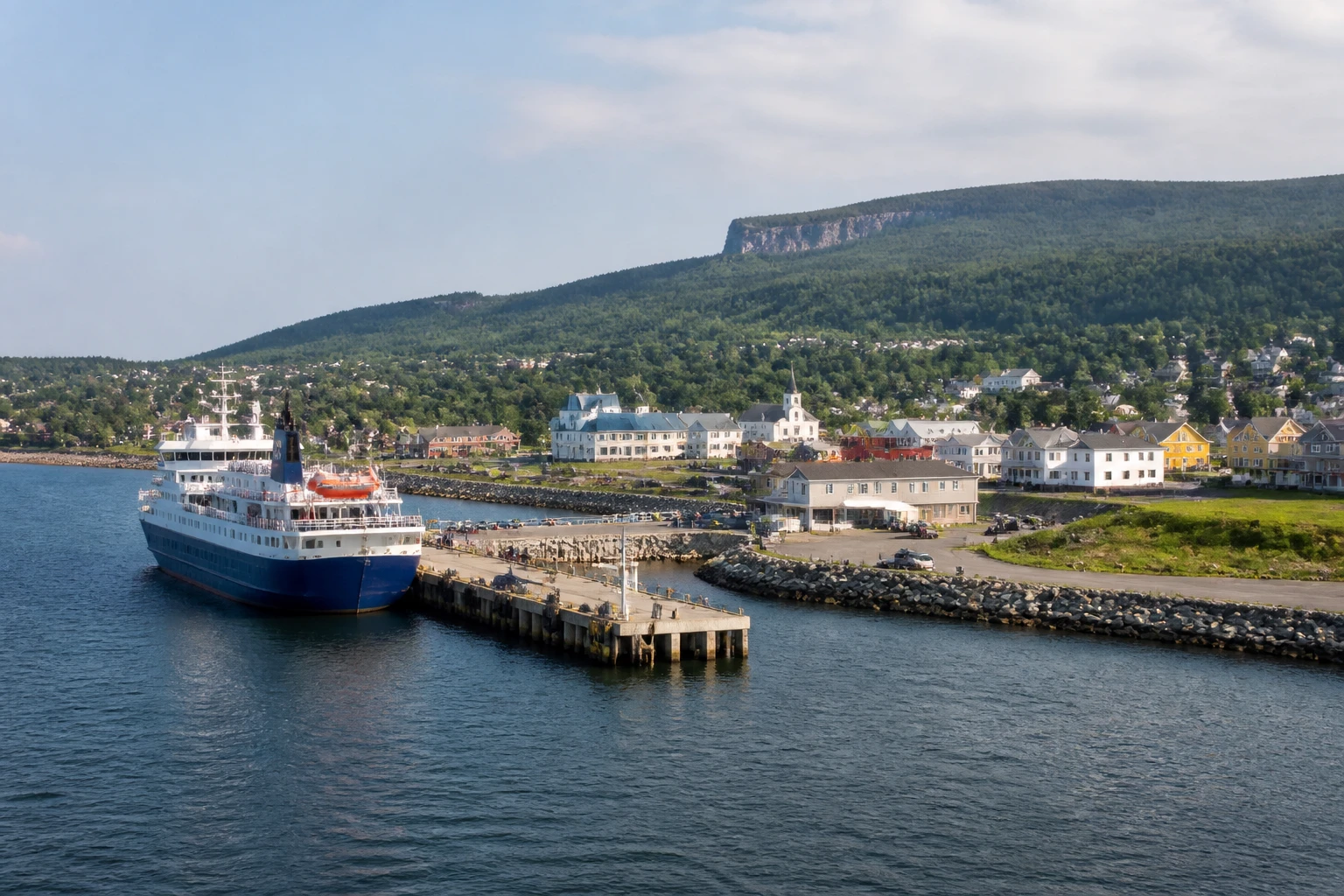 Representative cruise port destination view: Gaspe, Canada; passenger waterfront and harbor water, not an exact landmark photograph.