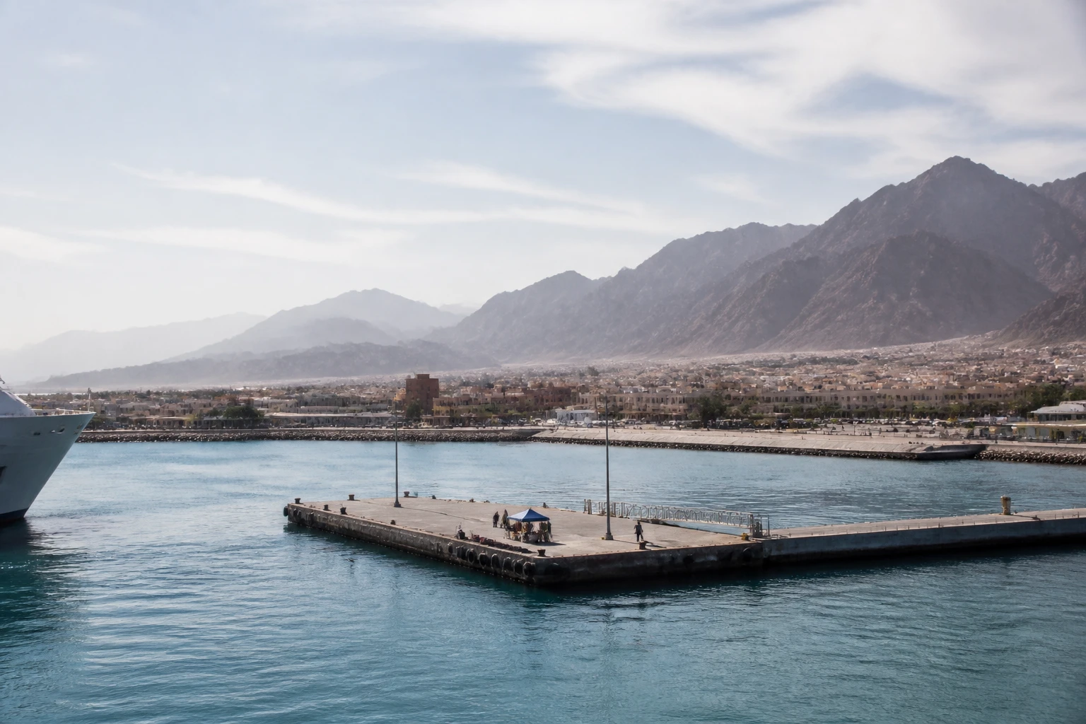 Representative cruise port destination view: Sokhna, Egypt; passenger waterfront and harbor water, not an exact landmark photograph.